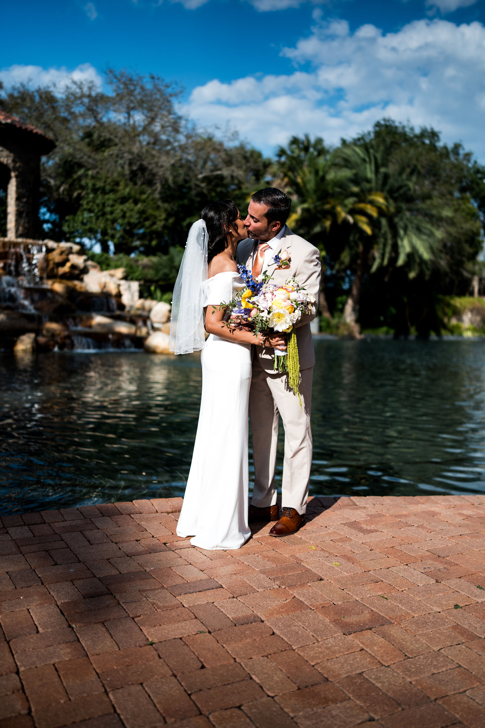 Couple kissing by the water
